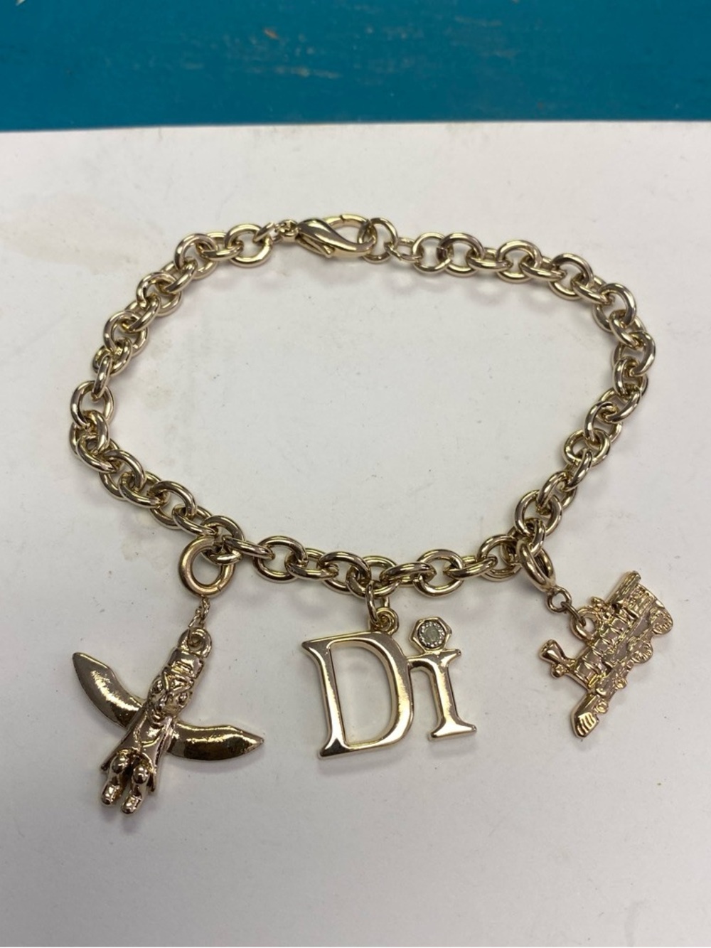 Gold Tone 'Di' Charm Bracelet